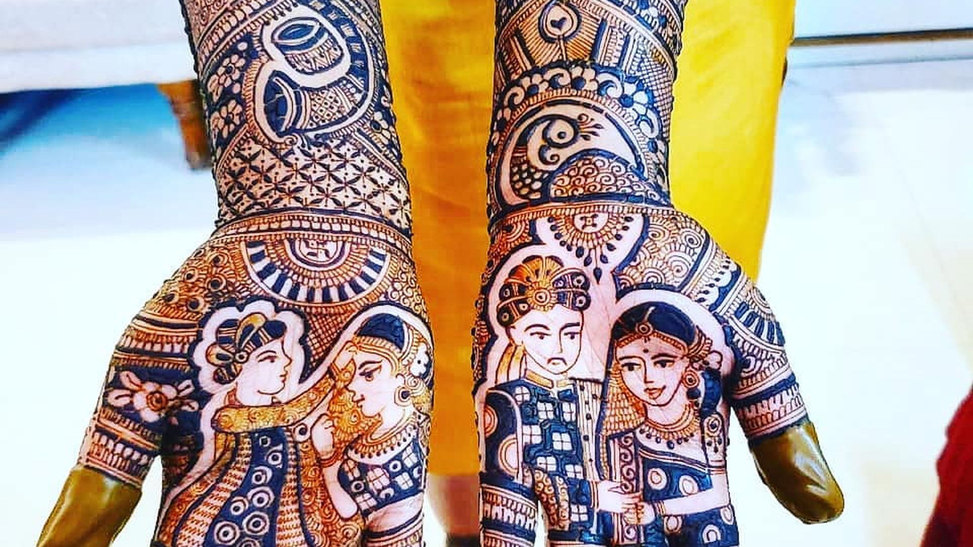Portrait mehendi of bride and groom on both palms by Mehnaz Zaman