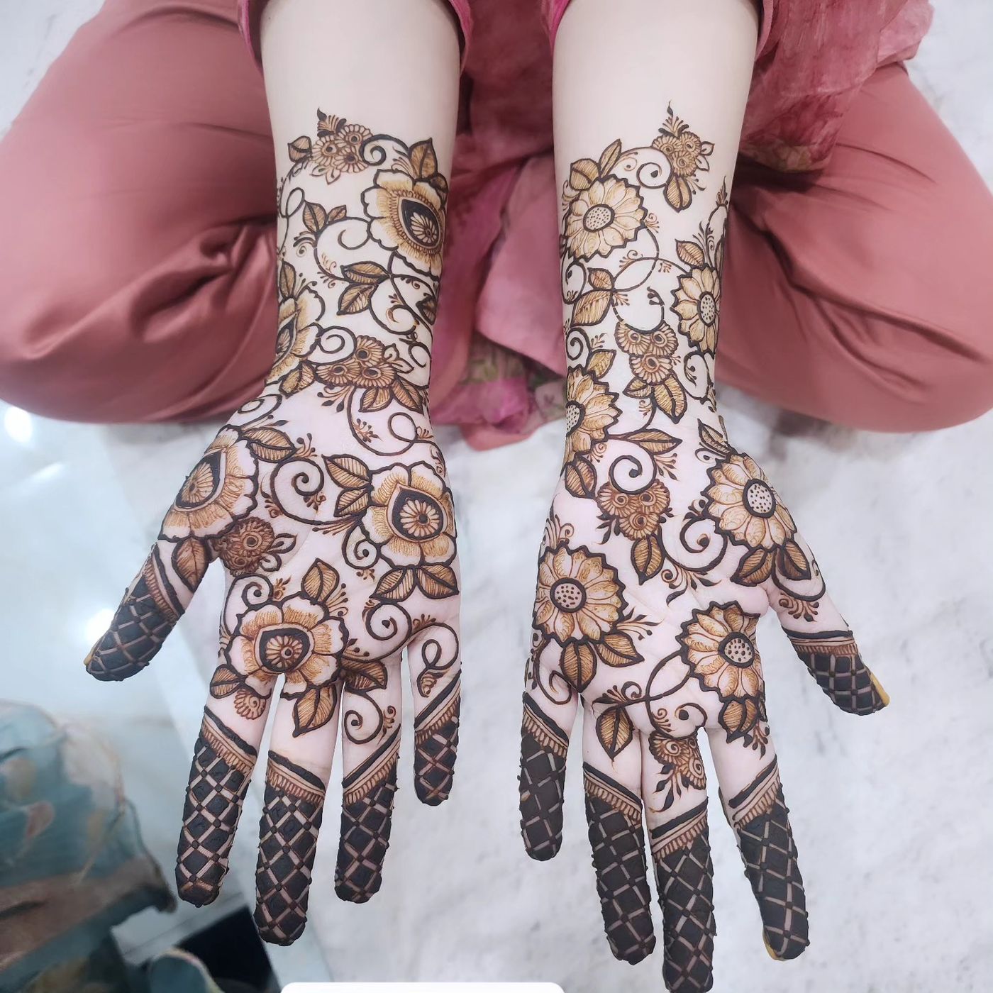 Bridal floral mehendi on forearm by Mehnaz Zaman