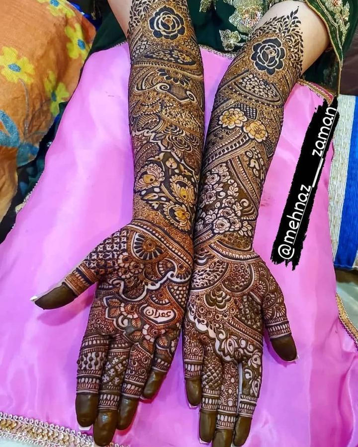 Bridal full arm mehendi on pink dupatta