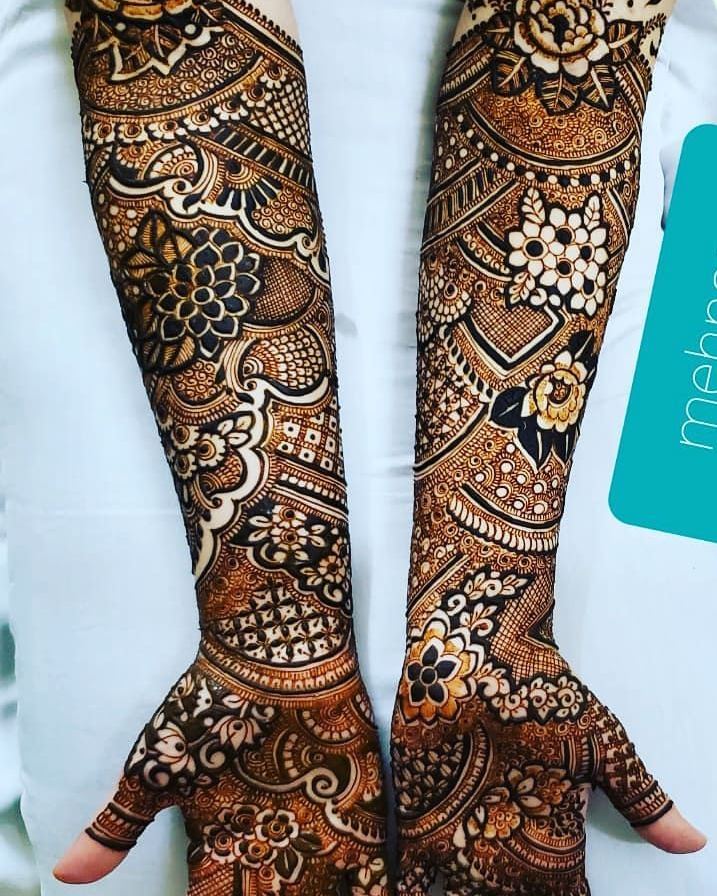 Bridal full arm mehendi with jaali and floral bands