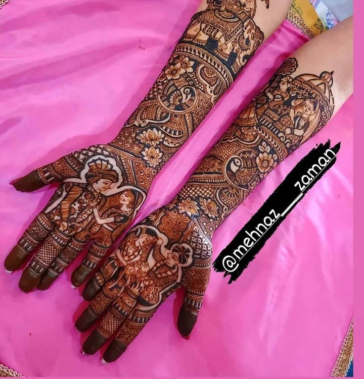 Bridal full arms mehendi with floral motifs on pink