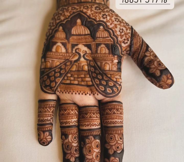 Bridal palm mehendi with palace / mandap architectural motif