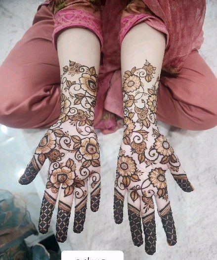 Floral mehendi on forearms
